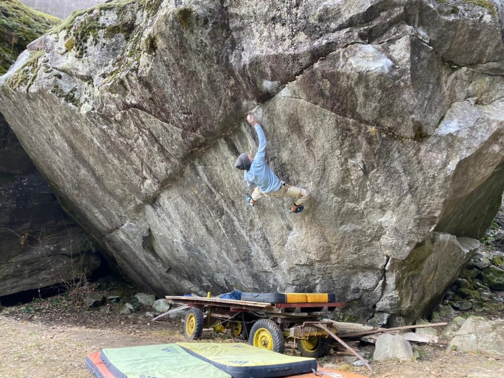 Vadim Timonov climbs Off the Wagon (8B+/V14), Val Bavona, Switzerland. He sent the bloc on his second go. Photo: Vadim Timonov.