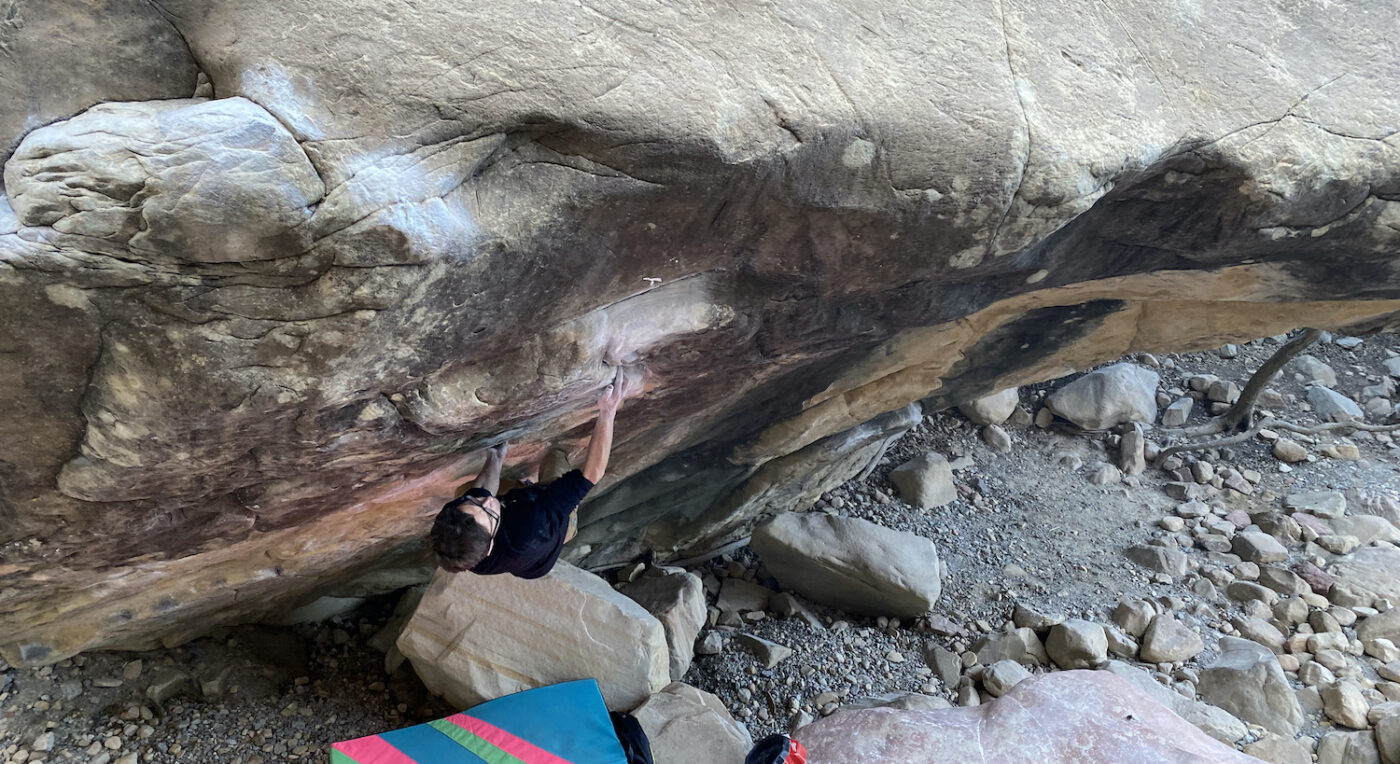 Drew Ruana sets up for the crux of Sleepwalker (V16/8C+), Red Rock Canyon, Nevada. Photo: Cameron Hörst.