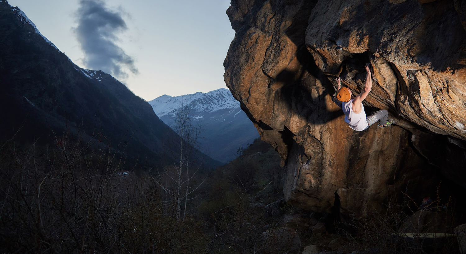 Russian climber Vadim Timonov climbing boulder problem
