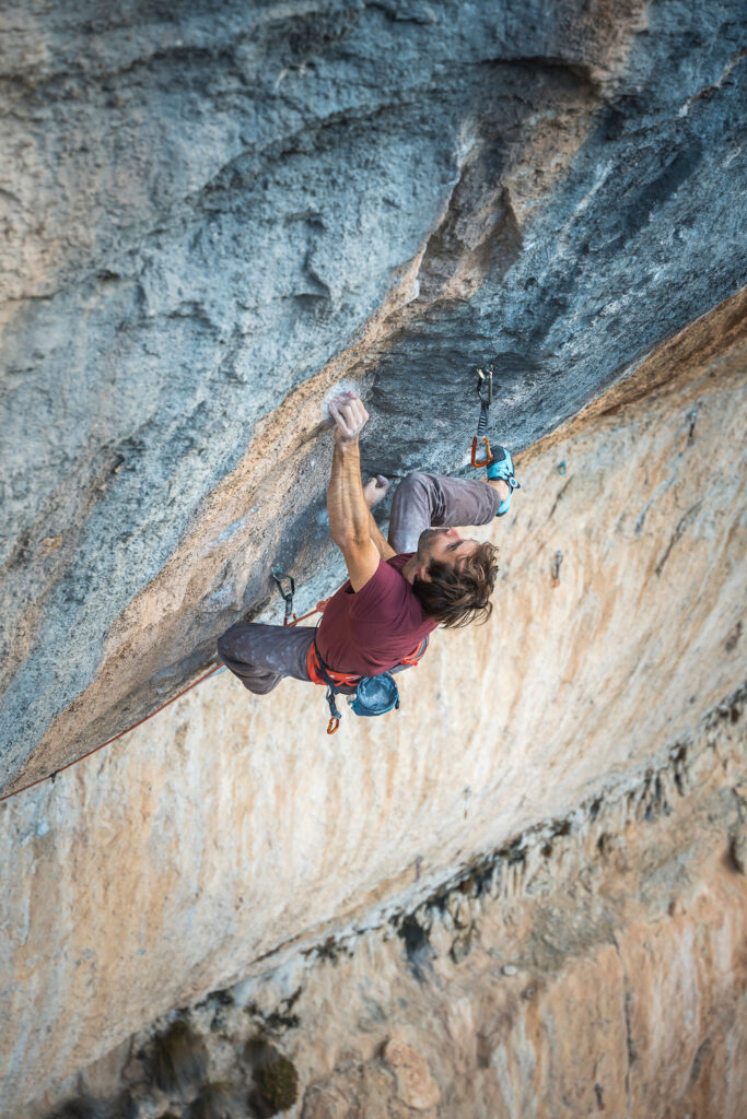 Rock climber Chris Sharma on his route Sleeping Lion, Siurana, Spain.